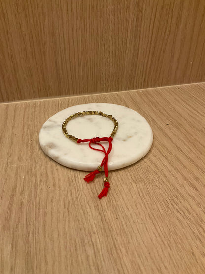 Copper Tibetan Bracelet with Red Thread – Protection, Energy, and Tradition