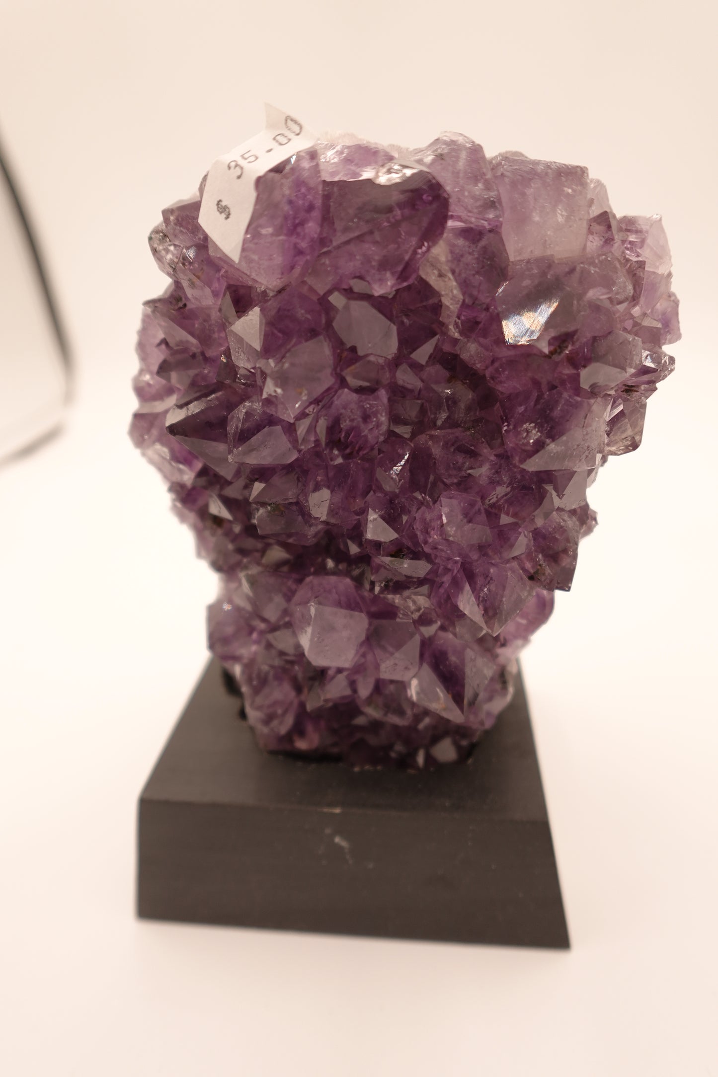 Amethyst Geode With Black Wooden Stand Medium