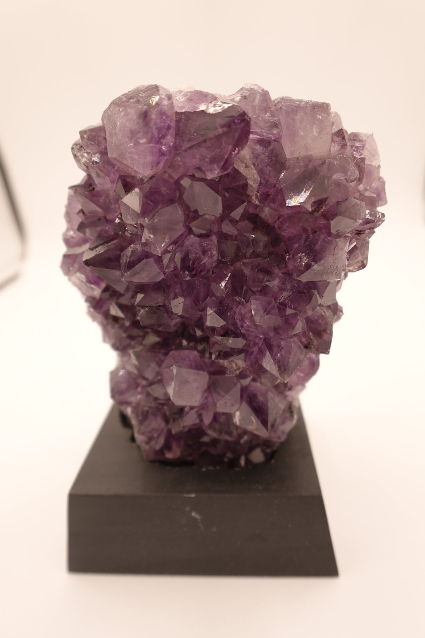 Amethyst Geode With Black Wooden Stand Medium