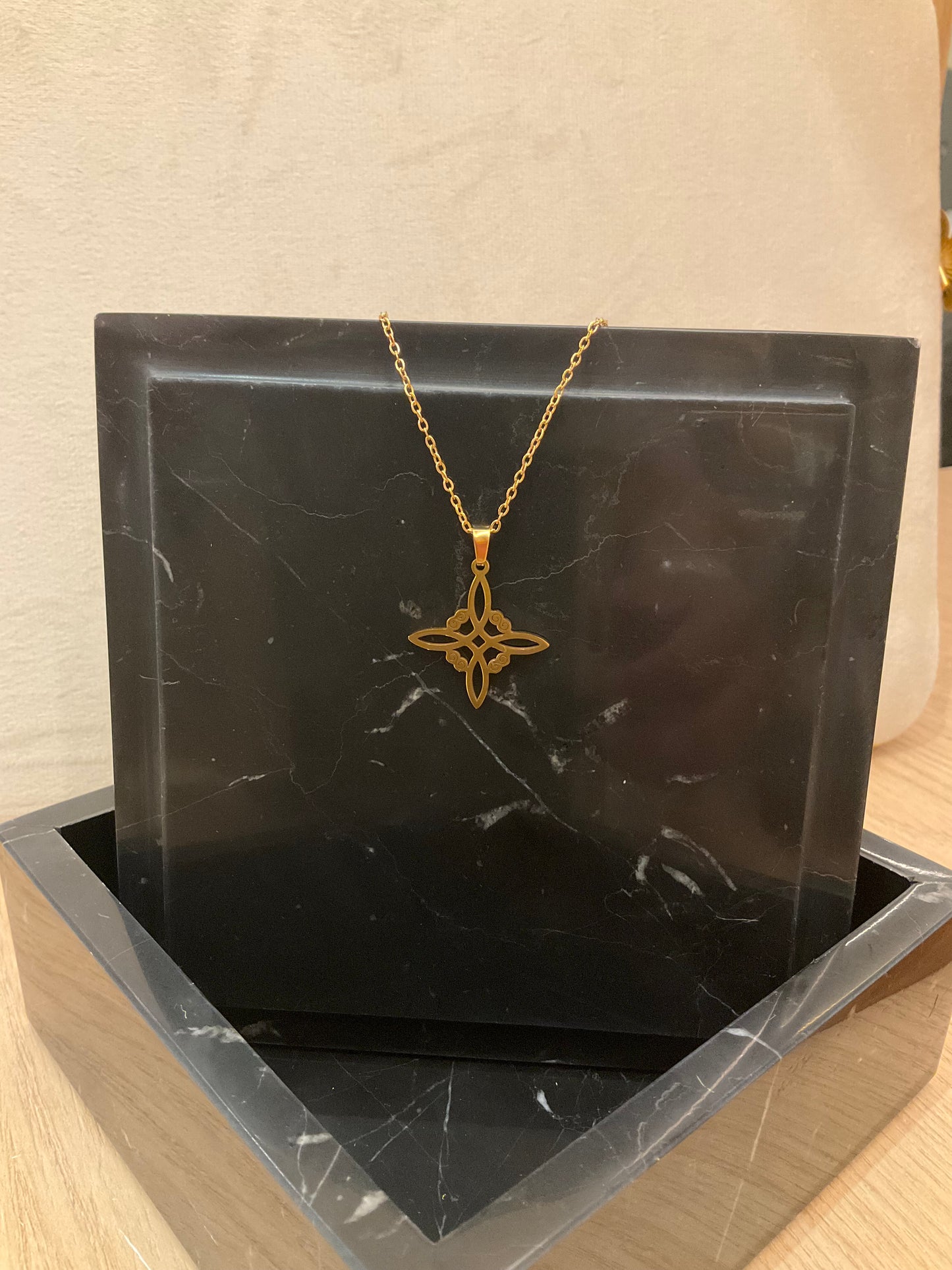 Golden Witch's Knot Pendant – Protective Jewelry for Energy Balance