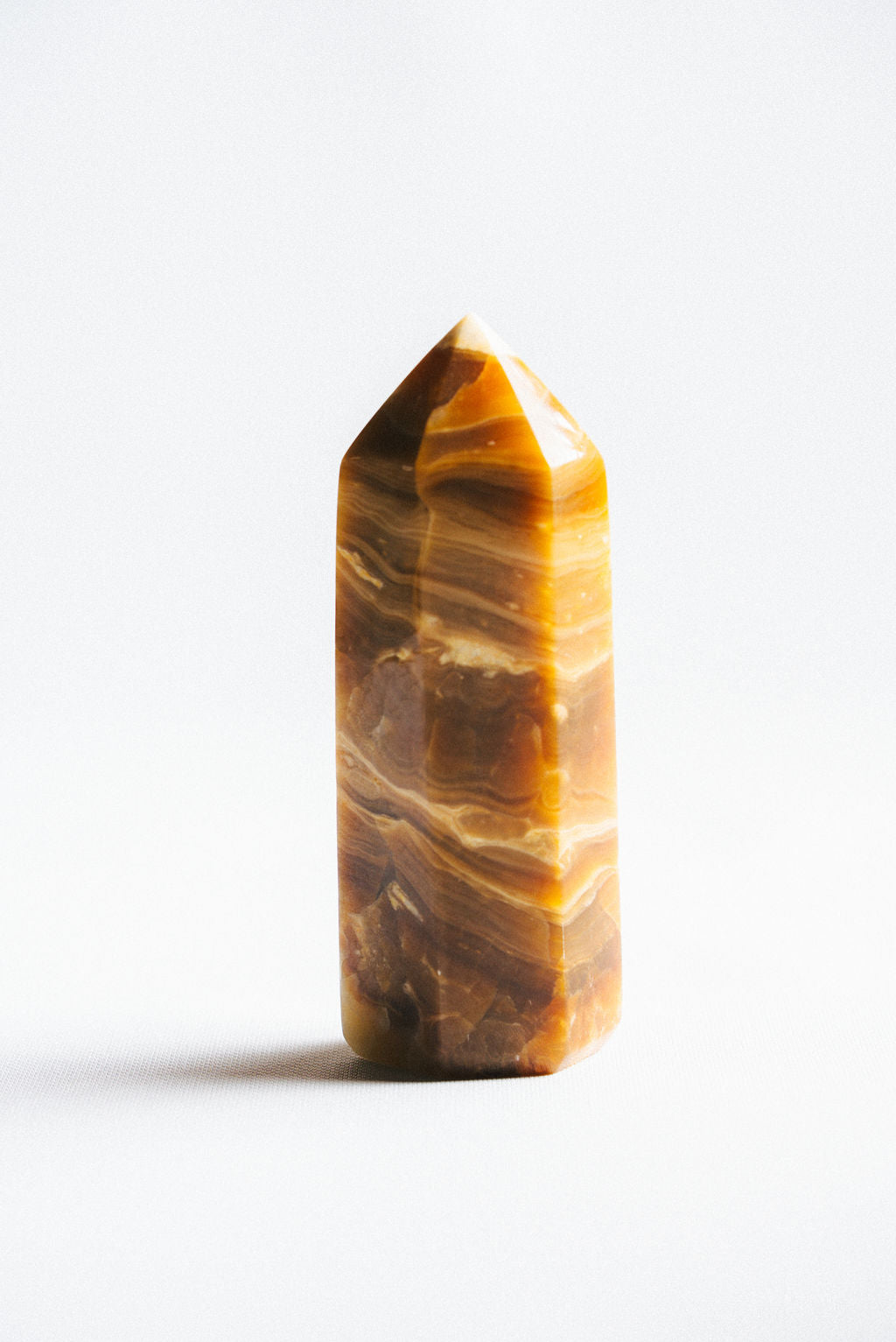 Decorative-Chocolate-Calcite-Tower-for-Stability-and-Warm-Energy