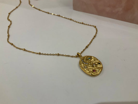 Gold-Celestial-Protection-Pendant-with-Cosmic-Symbols